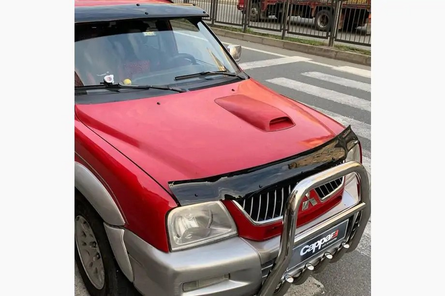 Дефлектор капоту Mitsubishi L200 1996-2006 30570496-010409-30010101 фото