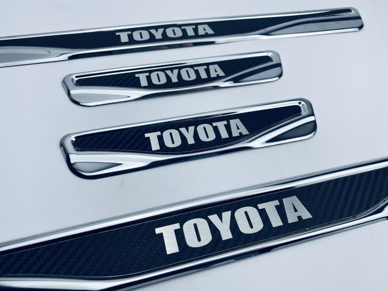 Накладки на пороги Toyota Corolla 8 (E11) 1995+ (хром-карбон) TAN24 00-00011780/7 фото