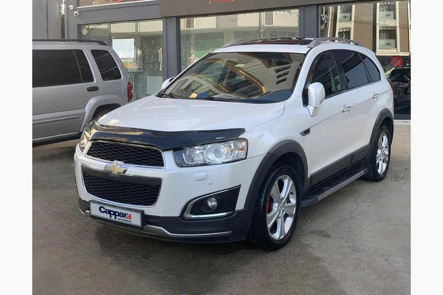 Дефлектор капоту Chevrolet Captiva 2006-2019 30180112-010409-30010101 фото