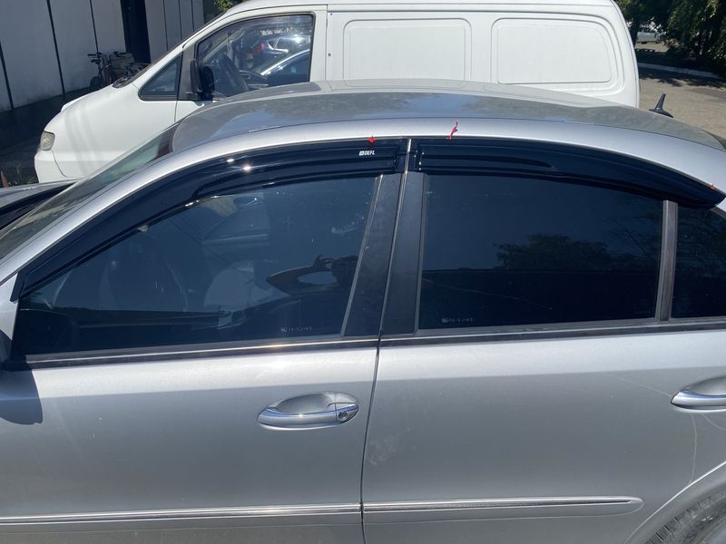 Дефлектори вікон Mercedes E-class W-211 2003-2009 Sedan накладні (DEFL) Q2 00-00014452 фото
