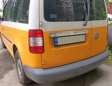 Volkswagen Caddy 2004-2010 Накладка над номером (2 дверні, нерж) Без надпису, OmsaLine - Італійська нержавійка 7520054 фото